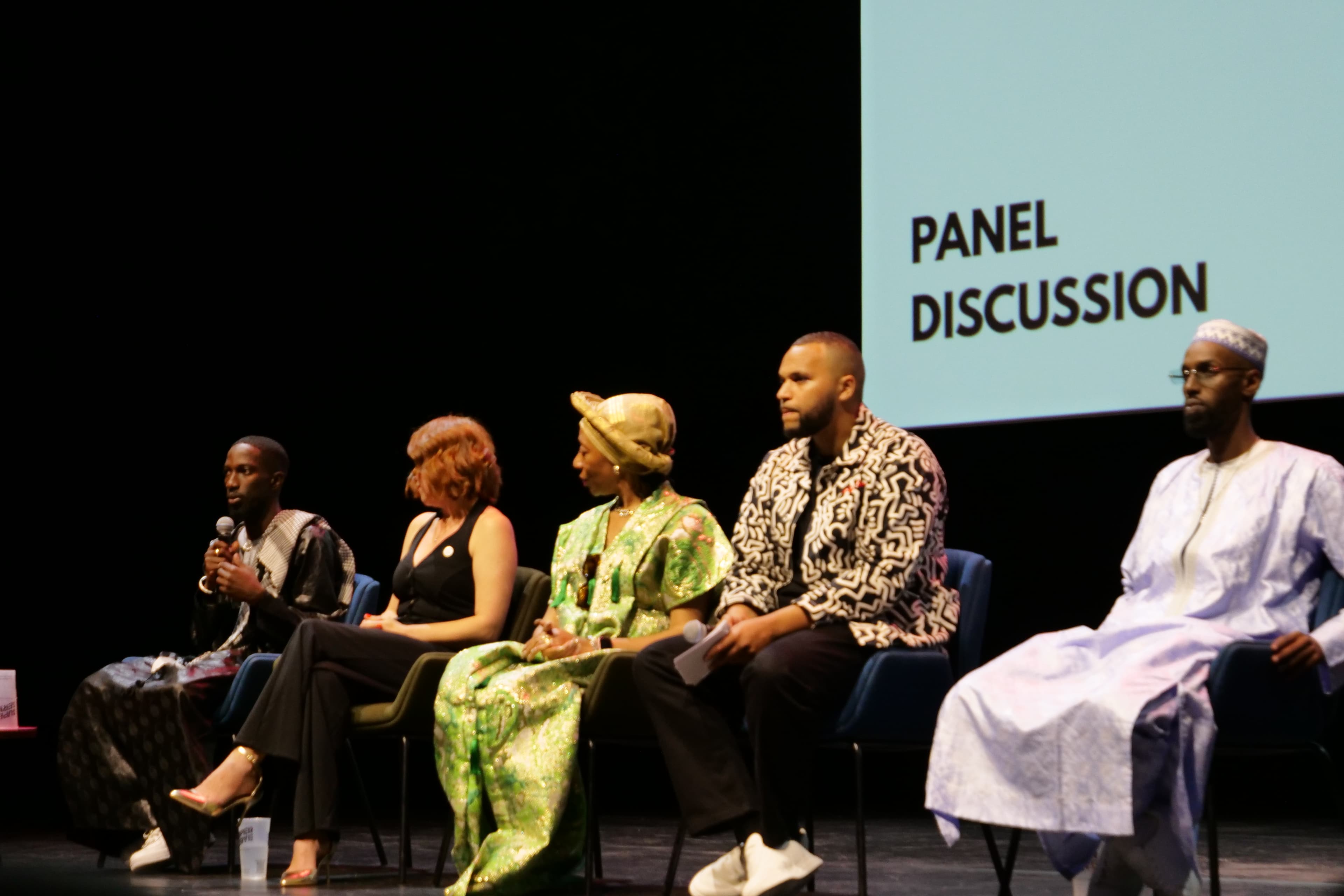 Man speaking on panel